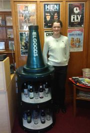 Amy with her display cabinet